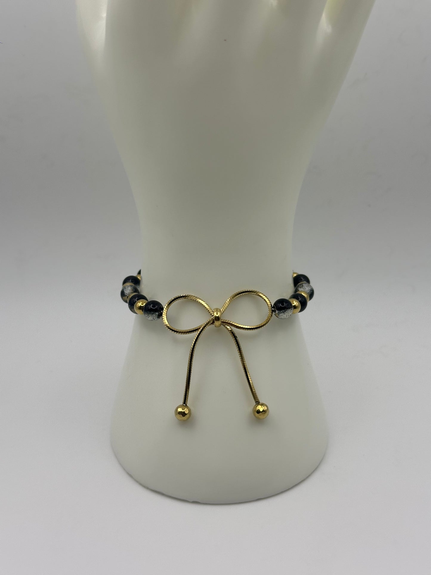 Gold Bow w/ Black Marble Beads Bracelet